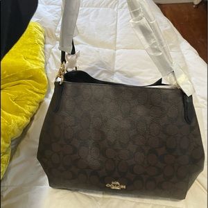 Coach “Halle” leather tote